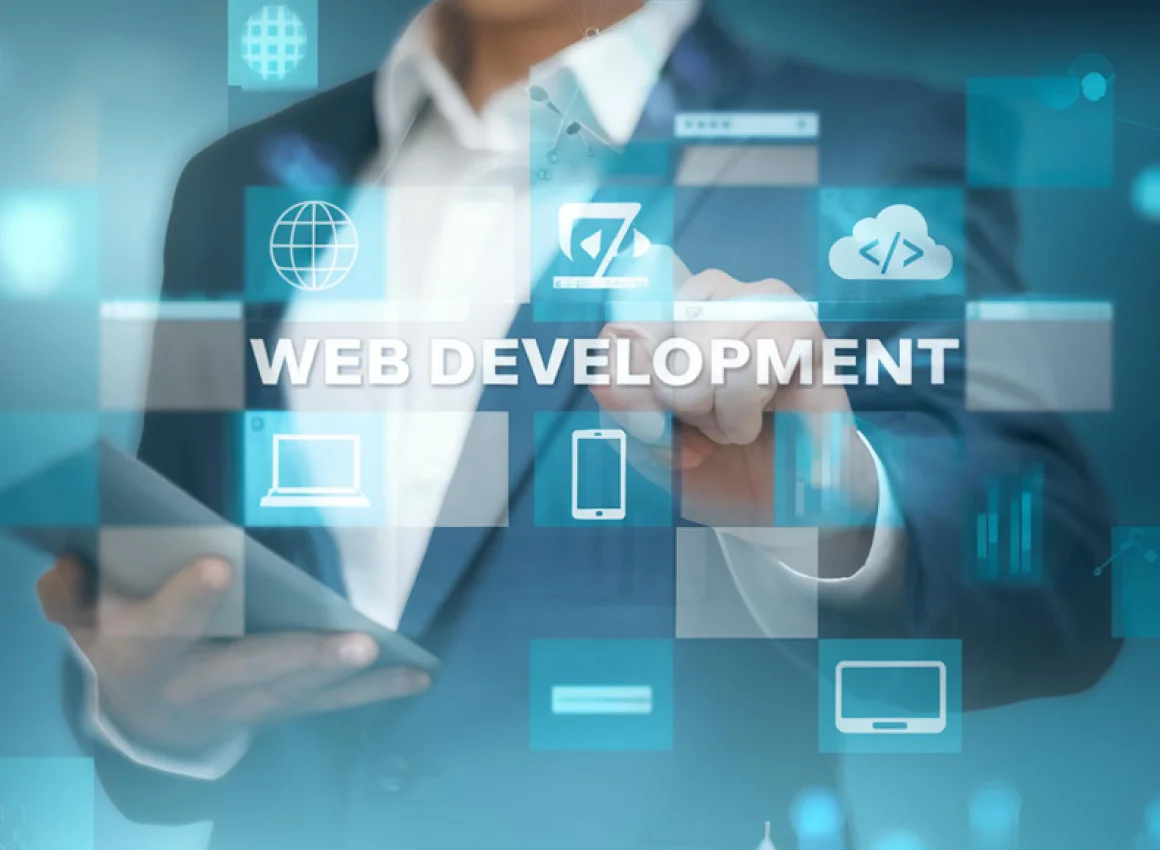 Developer working on an Angular application with code and design elements around them